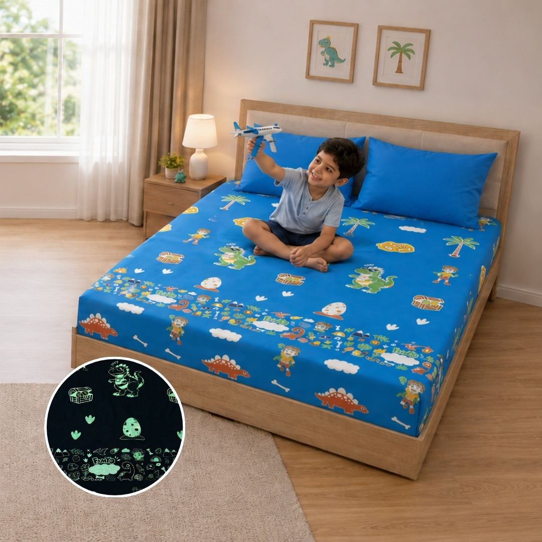 Pack of 2 Rexy the Dino glow bedsheet sets for kids featuring king-size fitted bedsheets, matching pillow covers, premium 300 TC cotton-blend microfiber, glow in the dark design, breathable comfort, elastic corners, and child-safe materials.