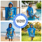 Rexy the Dino hooded poncho towel for kids featuring soft quick-dry terry fabric, lightweight absorbent design, wearable hood with knee-length coverage, and ideal for bath, beach, pool, swimming, travel, and everyday use. 