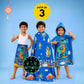 Rexy the Dino kids combo featuring a Glow Blanket, Hooded Poncho Towel, and 70 × 140 cm quick-dry terry bath towel, designed for cozy bedtime, bath time, swimming, beach trips, and everyday use.