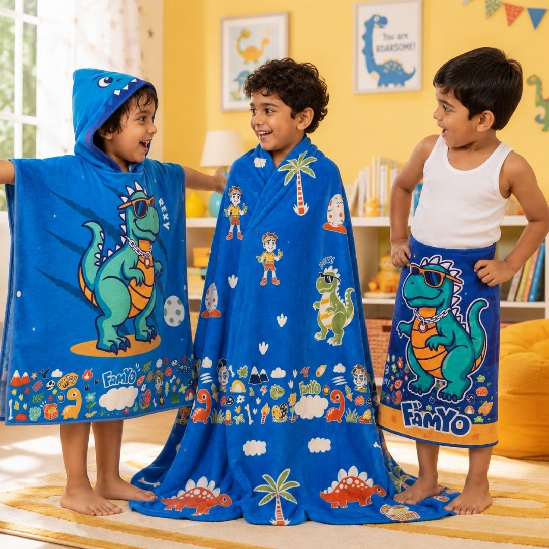 Rexy the Dino kids combo featuring a Glow Blanket, Hooded Poncho Towel, and 70 × 140 cm quick-dry terry bath towel, designed for cozy bedtime, bath time, swimming, beach trips, and everyday use.