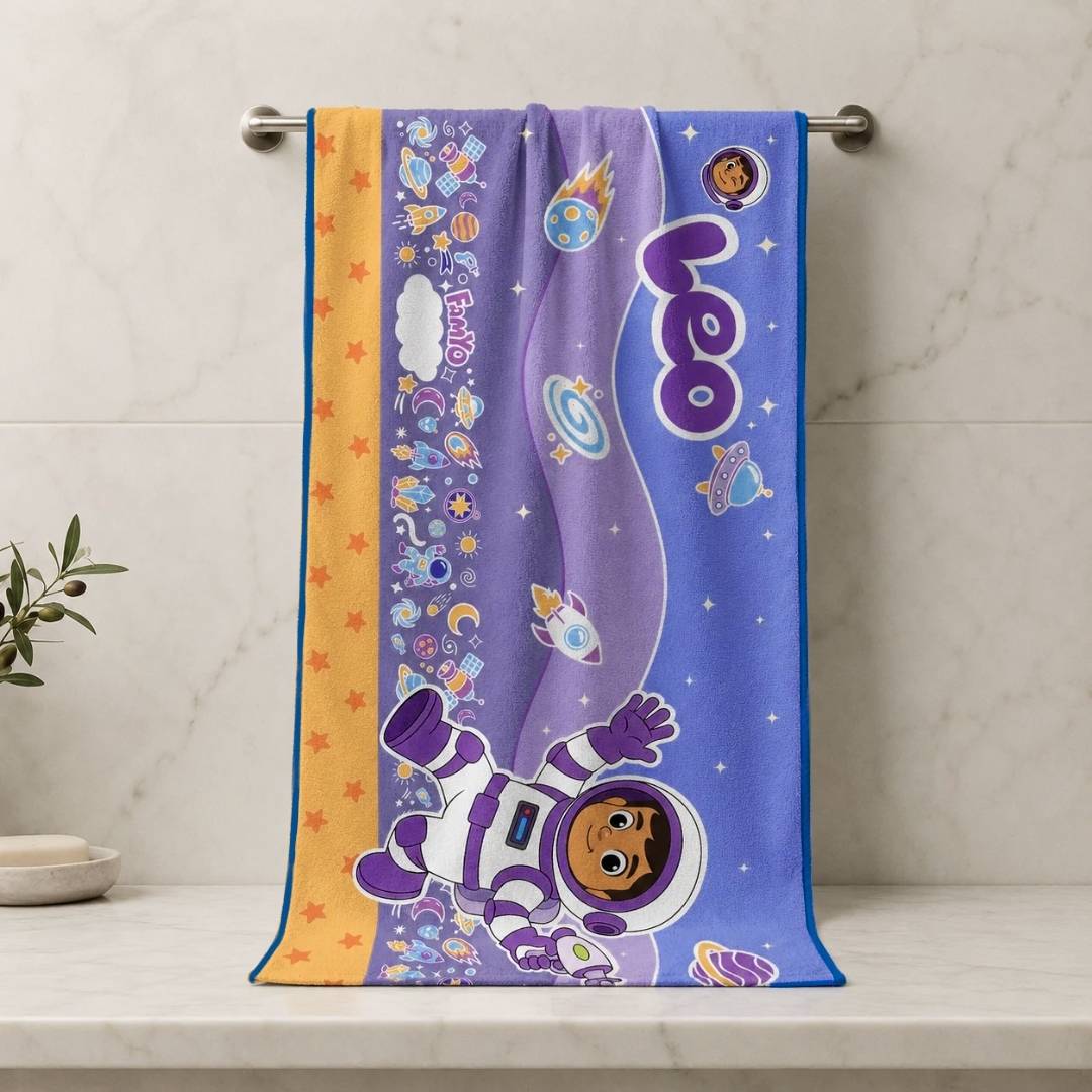 Famyo Leo the Astronaut Flat Towel for Kids made with premium microfiber fabric featuring quick dry technology, lightweight and travel friendly design, fade resistant print, soft and highly absorbent for bath, beach, swimming and everyday use.