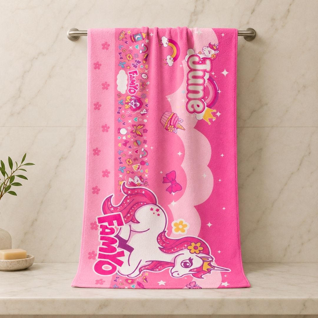 June the Unicorn kids towel featuring soft quick-dry terry fabric, lightweight absorbent design, 70 × 140 cm size, and ideal for bath, beach, pool, swimming, travel, and everyday use.