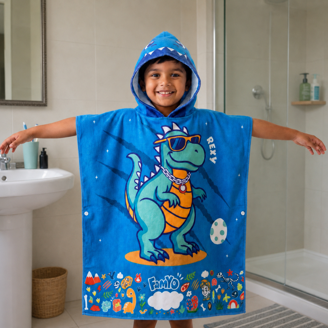 Rexy the Dino hooded poncho towel for kids featuring soft quick-dry terry fabric, lightweight absorbent design, wearable hood with knee-length coverage, and ideal for bath, beach, pool, swimming, travel, and everyday use.