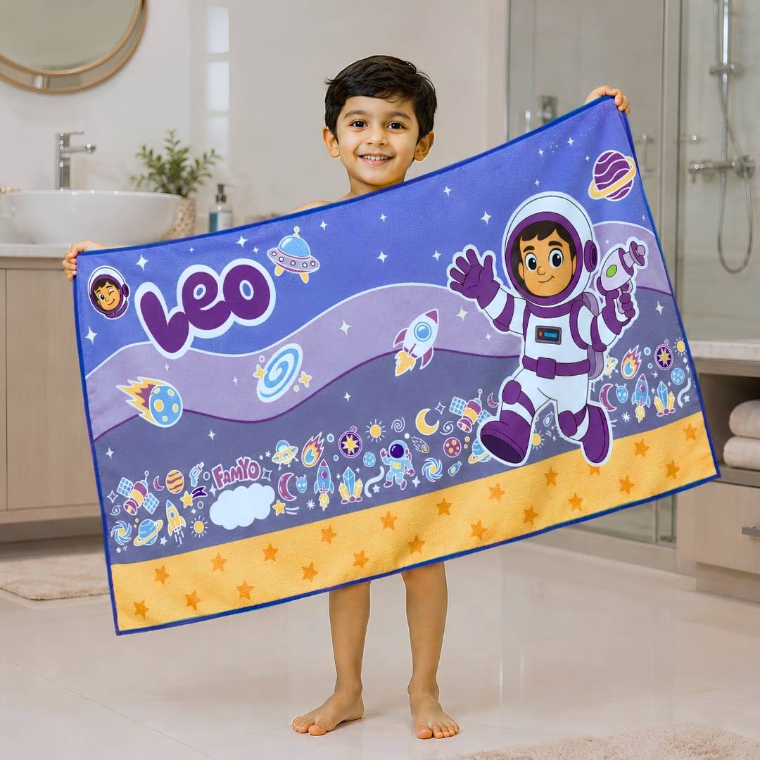 Famyo Leo the Astronaut Flat Towel for Kids made with premium microfiber fabric featuring quick dry technology, lightweight and travel friendly design, fade resistant print, soft and highly absorbent for bath, beach, swimming and everyday use.