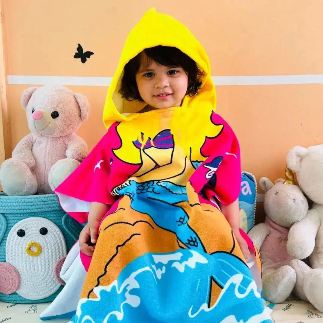 Cute Pink Mermaid Poncho Bath Towel for Kids, 1-7 years | Quick-Drying Microfiber Kids Towel. Cool Poncho Bath Robe Towels for Kids at lowest prices only @ Famyo. Shop 2 Poncho Towels @ Just Rs 999 with poncho999