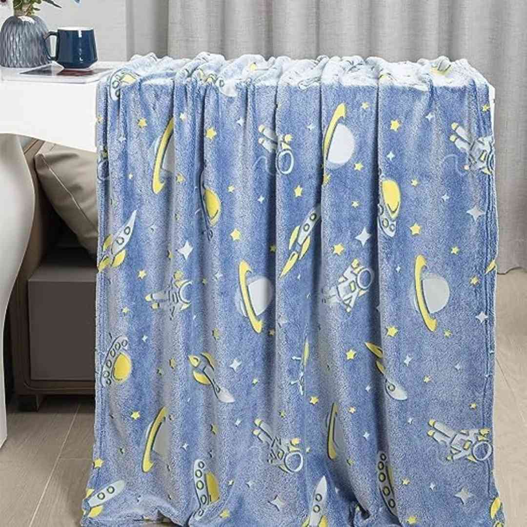 Space glow blanket for kids – astronaut and moon design by Famyo