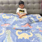 Kids glow blanket – blue dino theme with stars that light up at night