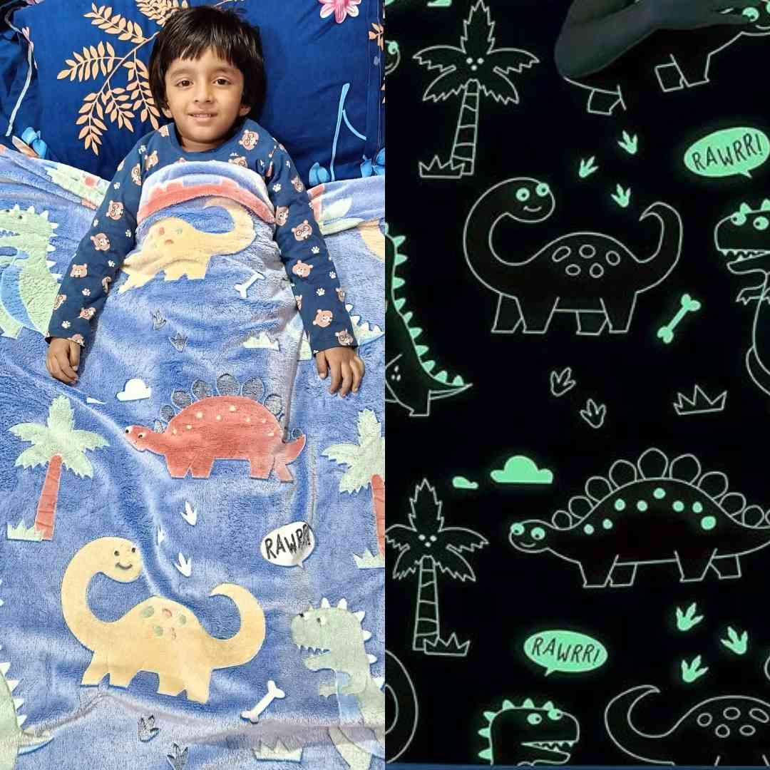 Kids dinosaur blanket – glow in the dark design in soft blue fabric