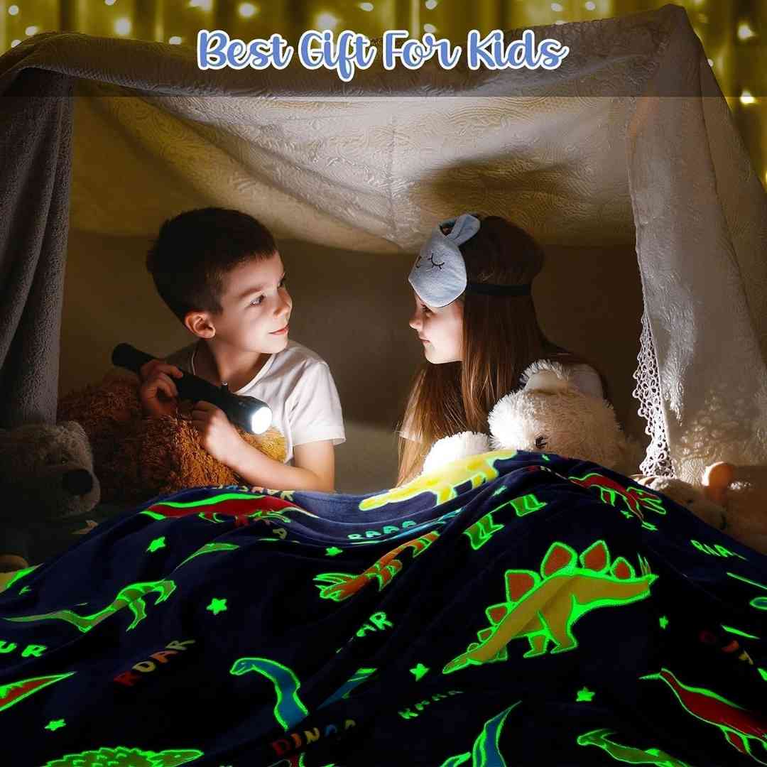 AC blanket for kids – glow in dark dino theme by Famyo, soft microfiber