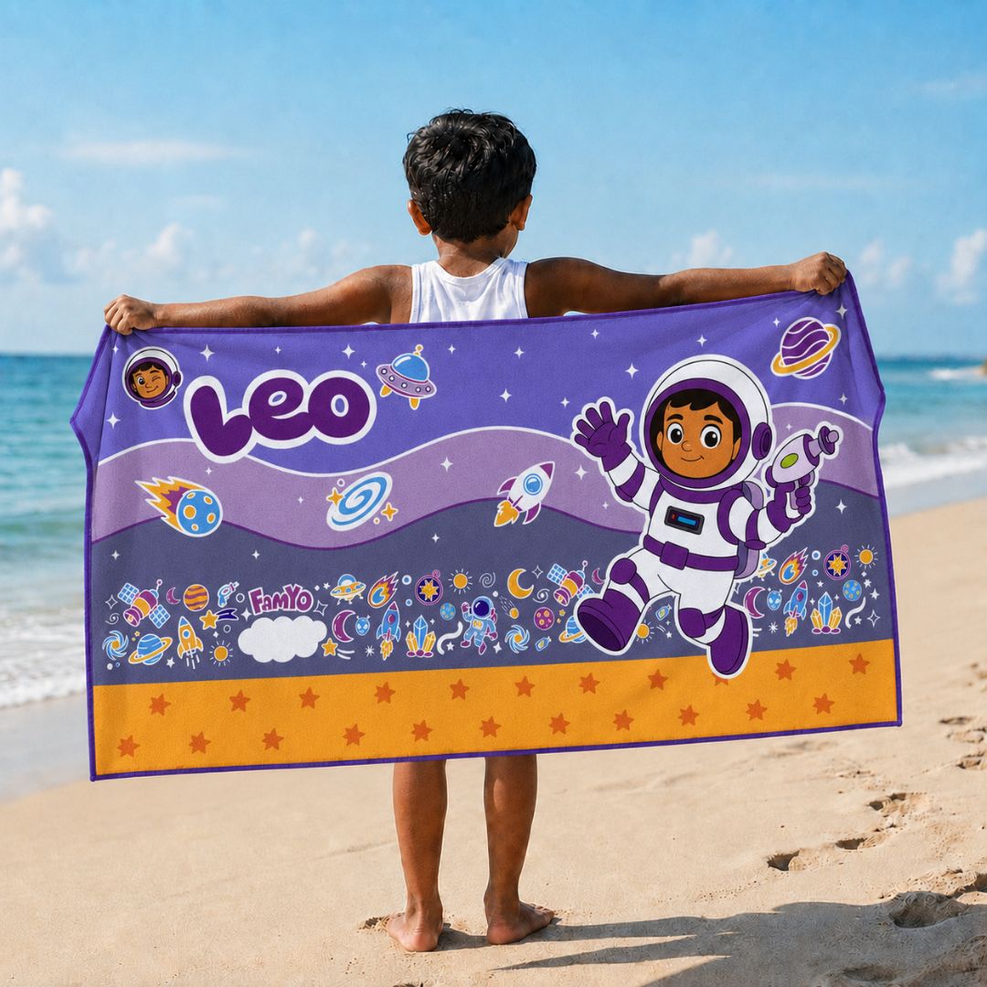 Leo the Astronaut kids towel featuring soft quick-dry terry fabric, lightweight absorbent design, 70 × 140 cm size, and ideal for bath, beach, pool, swimming, travel, and everyday use.