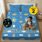 Pack of 2 Rexy the Dino glow bedsheet sets for kids featuring king-size fitted bedsheets, matching pillow covers, premium 300 TC cotton-blend microfiber, glow in the dark design, breathable comfort, elastic corners, and child-safe materials.